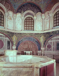 The apse with the baptismal font